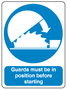 A clear image of Guards Must Be In Position  Label from Fine Cut Labels Direct